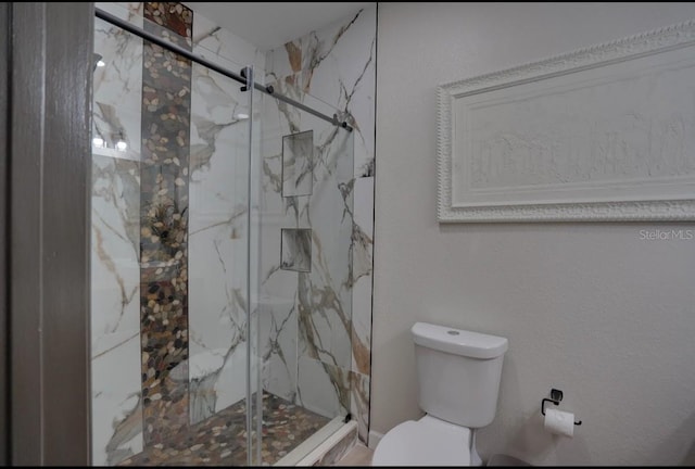 3176 Feltrim Pl Unit 302, Kissimmee, FL 34747 - full bathroom featuring toilet and a marble finish shower