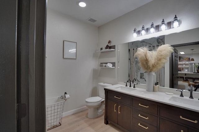 3176 Feltrim Pl Unit 302, Kissimmee, FL 34747 - full bathroom with wood finished floors and double vanity