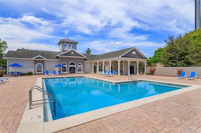 3176 Feltrim Pl Unit 302, Kissimmee, FL 34747 - community pool featuring a patio area