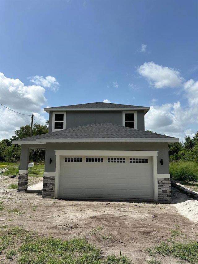 1132 Morse St, Altamonte Springs, FL 32701 - view of front of house featuring stucco siding, a garage, and stone siding