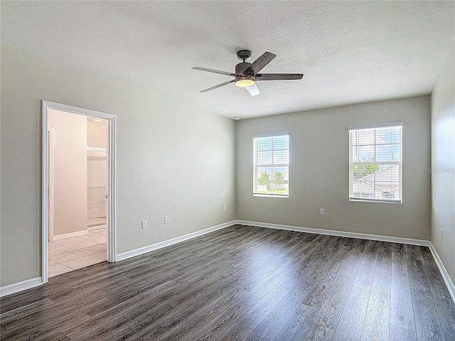 3975 Silverstream Ter, Sanford, FL 32771 - spare room with dark wood-style floors and a ceiling fan