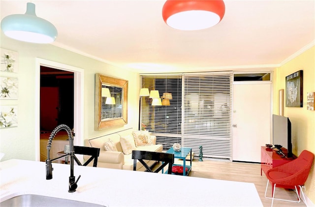 151 E Washington St Unit 508, Orlando, FL 32801 - bedroom featuring crown molding and wood finished floors