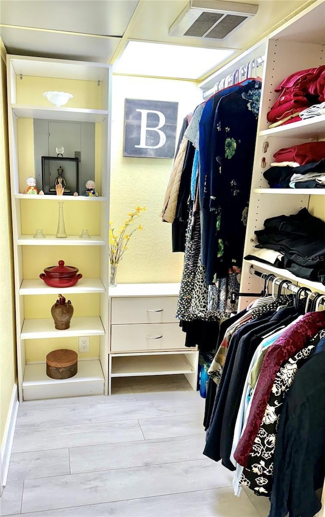 151 E Washington St Unit 508, Orlando, FL 32801 - walk in closet with wood finished floors