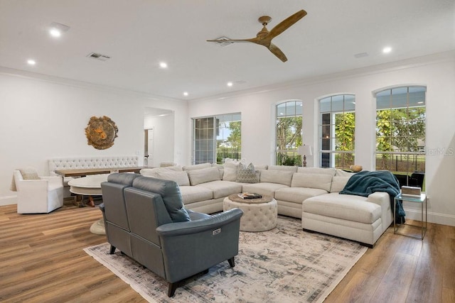 6047 Blakeford Dr, Windermere, FL 34786 - living room featuring ornamental molding, ceiling fan, recessed lighting, and wood finished floors