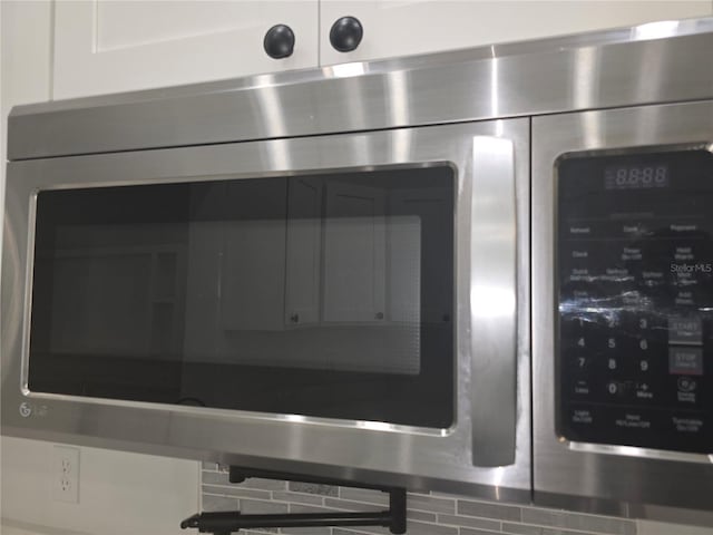 3030 Clubview Dr Unit Ge, Orlando, FL 32822 - detailed view of stainless steel microwave