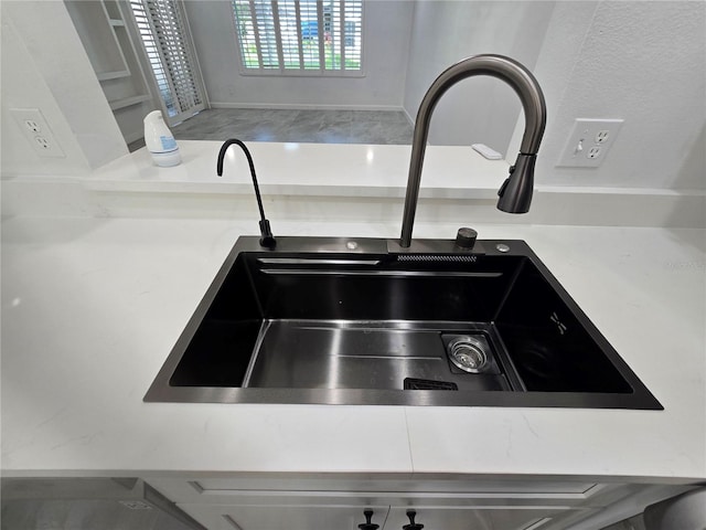 3030 Clubview Dr Unit Ge, Orlando, FL 32822 - kitchen view of a sink and light countertops