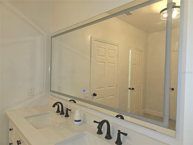 3030 Clubview Dr Unit Ge, Orlando, FL 32822 - bathroom featuring double vanity