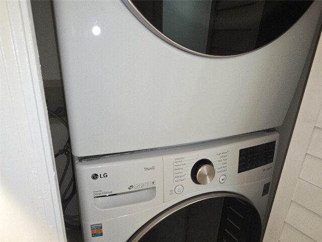 3030 Clubview Dr Unit Ge, Orlando, FL 32822 - washroom with stacked washing machine and dryer