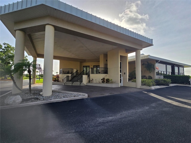 3030 Clubview Dr Unit Ge, Orlando, FL 32822 - view of car parking featuring stairs