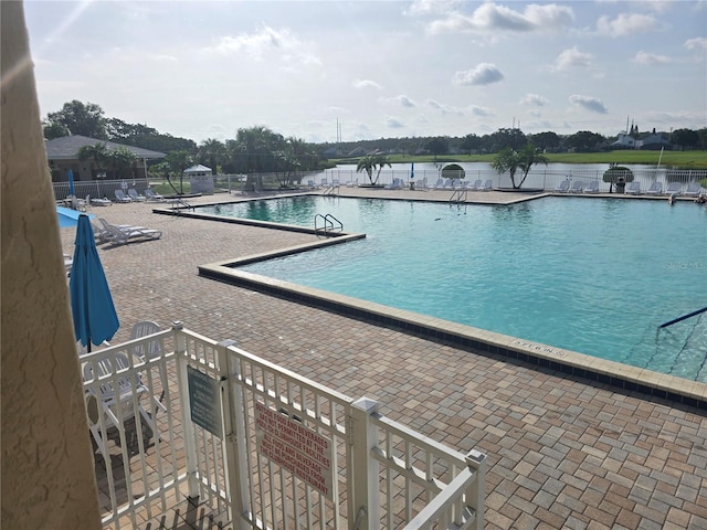 3030 Clubview Dr Unit Ge, Orlando, FL 32822 - community pool with a patio area