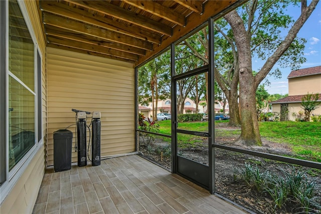 3030 Clubview Dr Unit Ge, Orlando, FL 32822 - unfurnished sunroom featuring beamed ceiling