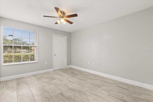 1924 Lake Atriums Cir Unit 52, Orlando, FL 32839 - unfurnished room featuring a ceiling fan and baseboards