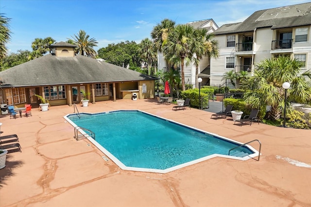 1924 Lake Atriums Cir Unit 52, Orlando, FL 32839 - community pool with a patio