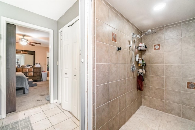 236 Longhorn Dr, Apopka, FL 32712 - bathroom featuring a tile shower, tile patterned flooring, ceiling fan, connected bathroom, and a closet