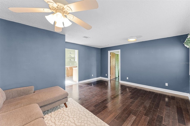2915 Dean Ridge Rd, Orlando, FL 32825 - living room with a textured ceiling, hardwood / wood-style flooring, and a ceiling fan