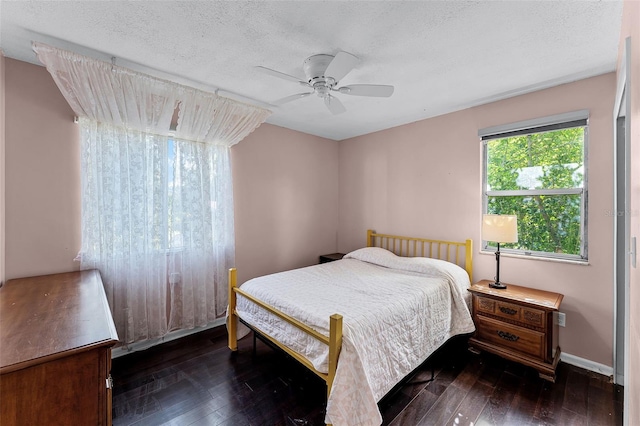 2915 Dean Ridge Rd, Orlando, FL 32825 - bedroom with hardwood / wood-style flooring, a ceiling fan, and a textured ceiling