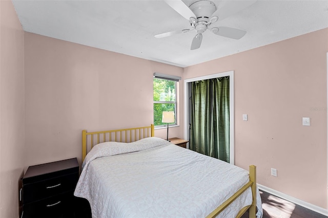 2915 Dean Ridge Rd, Orlando, FL 32825 - bedroom featuring ceiling fan and wood finished floors