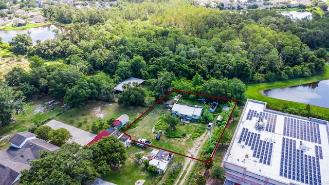 2915 Dean Ridge Rd, Orlando, FL 32825 - aerial view of property and surrounding area featuring a large body of water and property parcel outlined