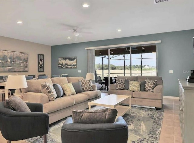 1606 Lima Ave, Kissimmee, FL 34747 - living area with recessed lighting, light tile patterned floors, and a ceiling fan