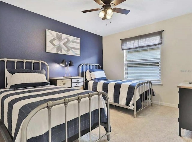 1606 Lima Ave, Kissimmee, FL 34747 - bedroom featuring light carpet and ceiling fan