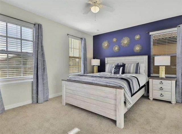 1606 Lima Ave, Kissimmee, FL 34747 - carpeted bedroom featuring baseboards and ceiling fan