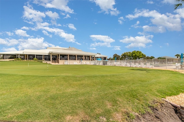 3887 Atrium Dr Unit 3, Orlando, FL 32822 - view of yard with an area to practice putting and view of golf course