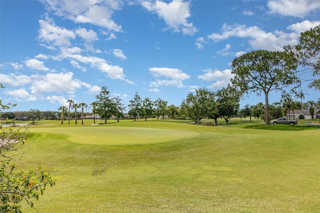 3887 Atrium Dr Unit 3, Orlando, FL 32822 - view of home's community featuring golf course view and a lawn