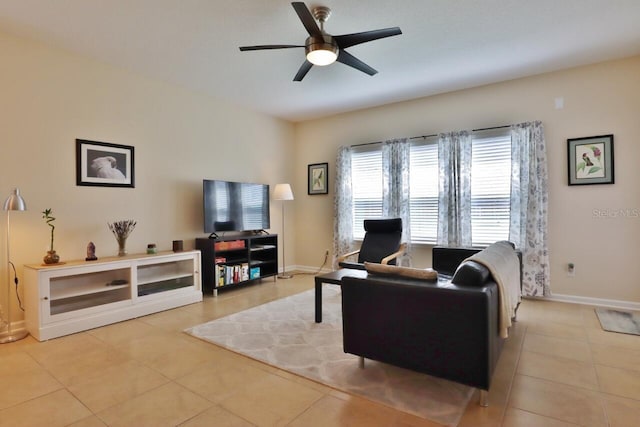 3281 Chestnut Ridge Way, Orange Park, FL 32065 - living area with light tile patterned floors and a ceiling fan