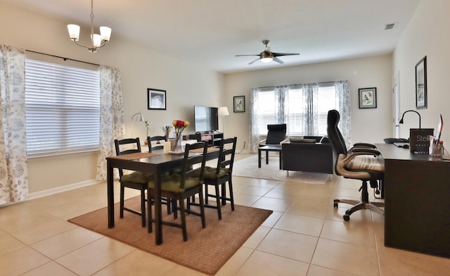 3281 Chestnut Ridge Way, Orange Park, FL 32065 - tiled dining space featuring ceiling fan, an office area, and a chandelier