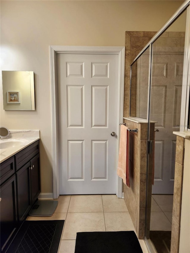 3281 Chestnut Ridge Way, Orange Park, FL 32065 - bathroom featuring vanity, tile patterned floors, and a stall shower