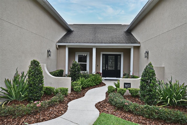 1653 Cheyenne Trl, Maitland, FL 32751 - entrance to property featuring stucco siding and a shingled roof