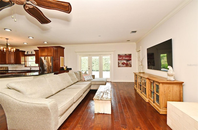 1653 Cheyenne Trl, Maitland, FL 32751 - living area featuring ornamental molding, a ceiling fan, dark wood-style floors, plenty of natural light, and recessed lighting