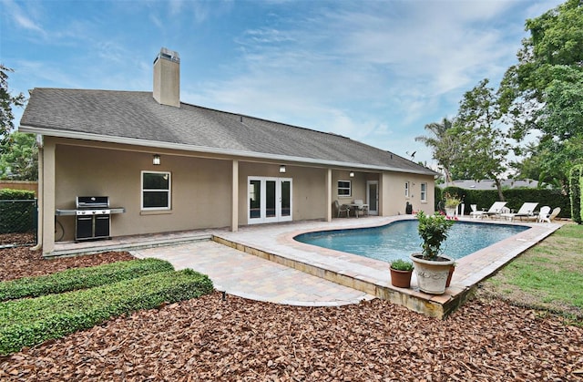 1653 Cheyenne Trl, Maitland, FL 32751 - view of pool featuring french doors, a patio area, and area for grilling