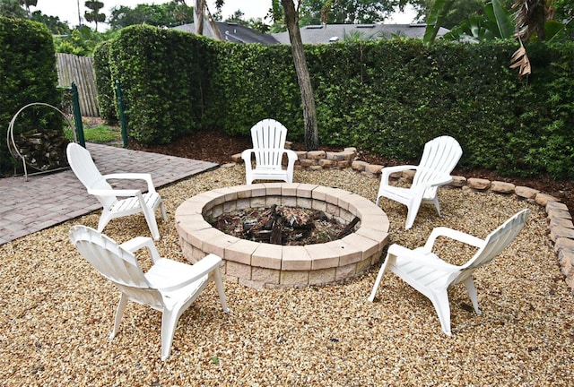1653 Cheyenne Trl, Maitland, FL 32751 - view of patio with an outdoor fire pit