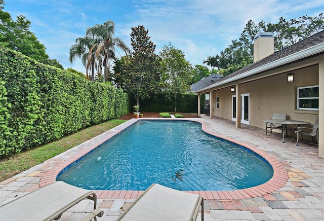 1653 Cheyenne Trl, Maitland, FL 32751 - view of swimming pool with a patio area and a fenced backyard