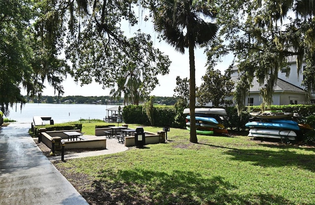 1653 Cheyenne Trl, Maitland, FL 32751 - view of home's community with a water view and a yard