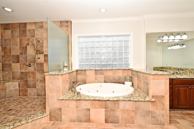 1653 Cheyenne Trl, Maitland, FL 32751 - full bathroom with walk in shower, a jetted tub, vanity, ornamental molding, and recessed lighting