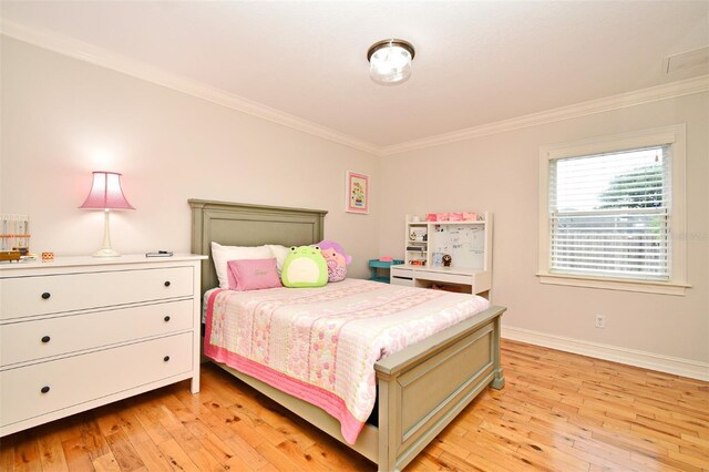 1653 Cheyenne Trl, Maitland, FL 32751 - bedroom with crown molding and light wood-style floors