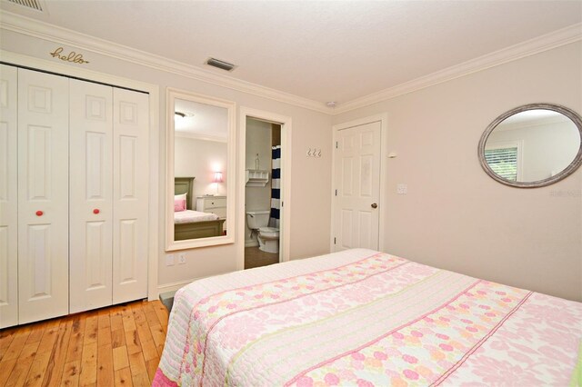 1653 Cheyenne Trl, Maitland, FL 32751 - bedroom featuring ornamental molding, hardwood / wood-style floors, and a closet