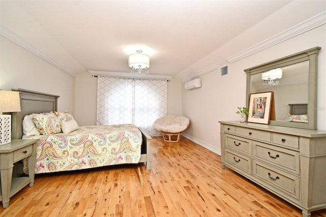 1653 Cheyenne Trl, Maitland, FL 32751 - bedroom featuring a chandelier, ornamental molding, light wood finished floors, and a wall mounted AC