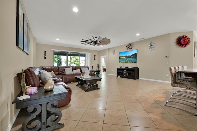 2319 Dammar St, Orlando, FL 32824 - living room featuring light tile patterned floors and recessed lighting