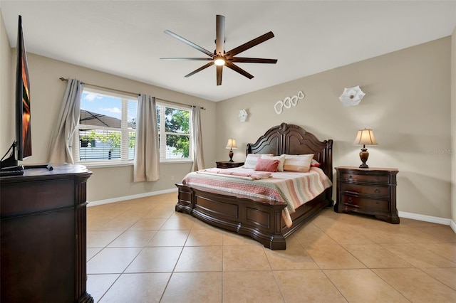 2319 Dammar St, Orlando, FL 32824 - bedroom with light tile patterned flooring and ceiling fan