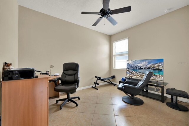 2319 Dammar St, Orlando, FL 32824 - home office with ceiling fan and light tile patterned floors