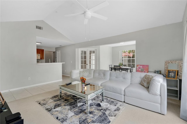900 Northern Dancer Way Unit 204, Casselberry, FL 32707 - living area with vaulted ceiling, ceiling fan, light colored carpet, and light tile patterned floors
