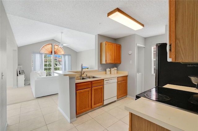 900 Northern Dancer Way Unit 204, Casselberry, FL 32707 - kitchen with dishwasher, open floor plan, a peninsula, vaulted ceiling, and stove