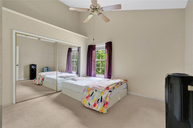 900 Northern Dancer Way Unit 204, Casselberry, FL 32707 - bedroom featuring carpet flooring, a towering ceiling, ceiling fan, and a closet