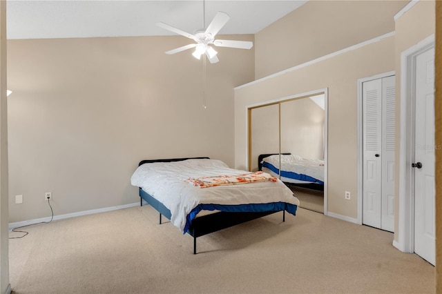 900 Northern Dancer Way Unit 204, Casselberry, FL 32707 - bedroom featuring carpet floors, high vaulted ceiling, two closets, and ceiling fan