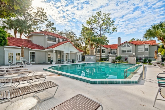 900 Northern Dancer Way Unit 204, Casselberry, FL 32707 - community pool featuring french doors and a patio area