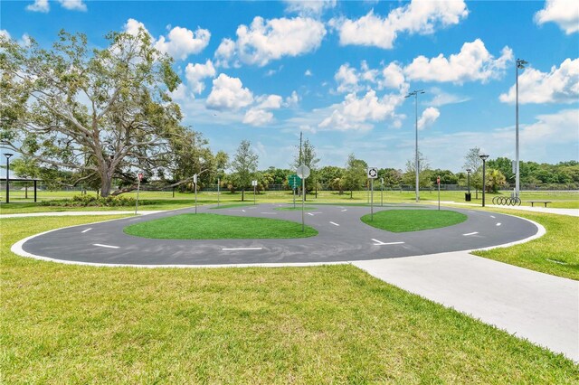 900 Northern Dancer Way Unit 204, Casselberry, FL 32707 - view of home's community featuring curved driveway and a lawn