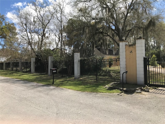 1910 NW 13th Pl, Ocala, FL 34475 - gate with a fenced front yard